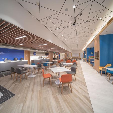 Holiday Inn Express Shanghai Huijin By Ihg Экстерьер фото