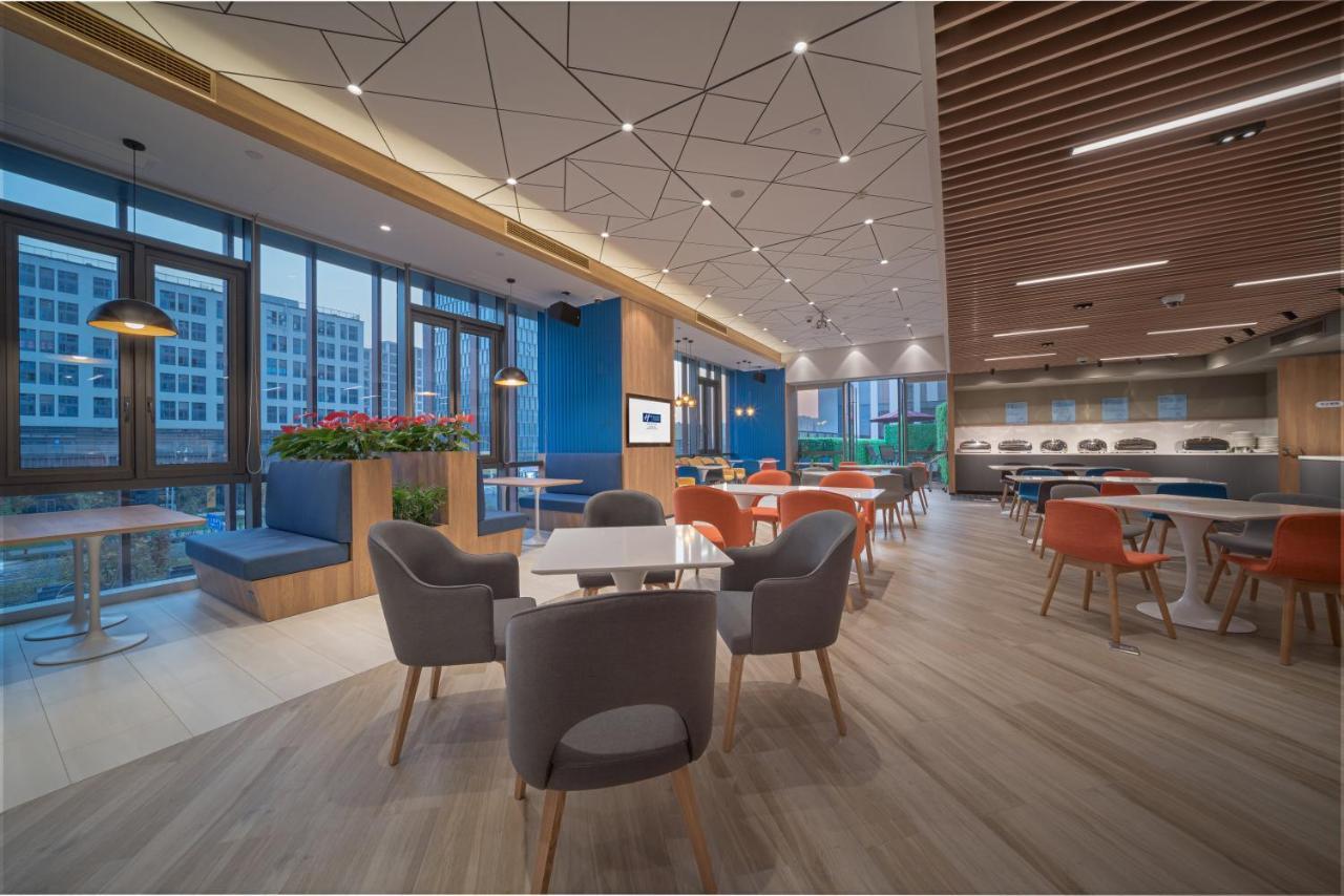 Holiday Inn Express Shanghai Huijin By Ihg Экстерьер фото