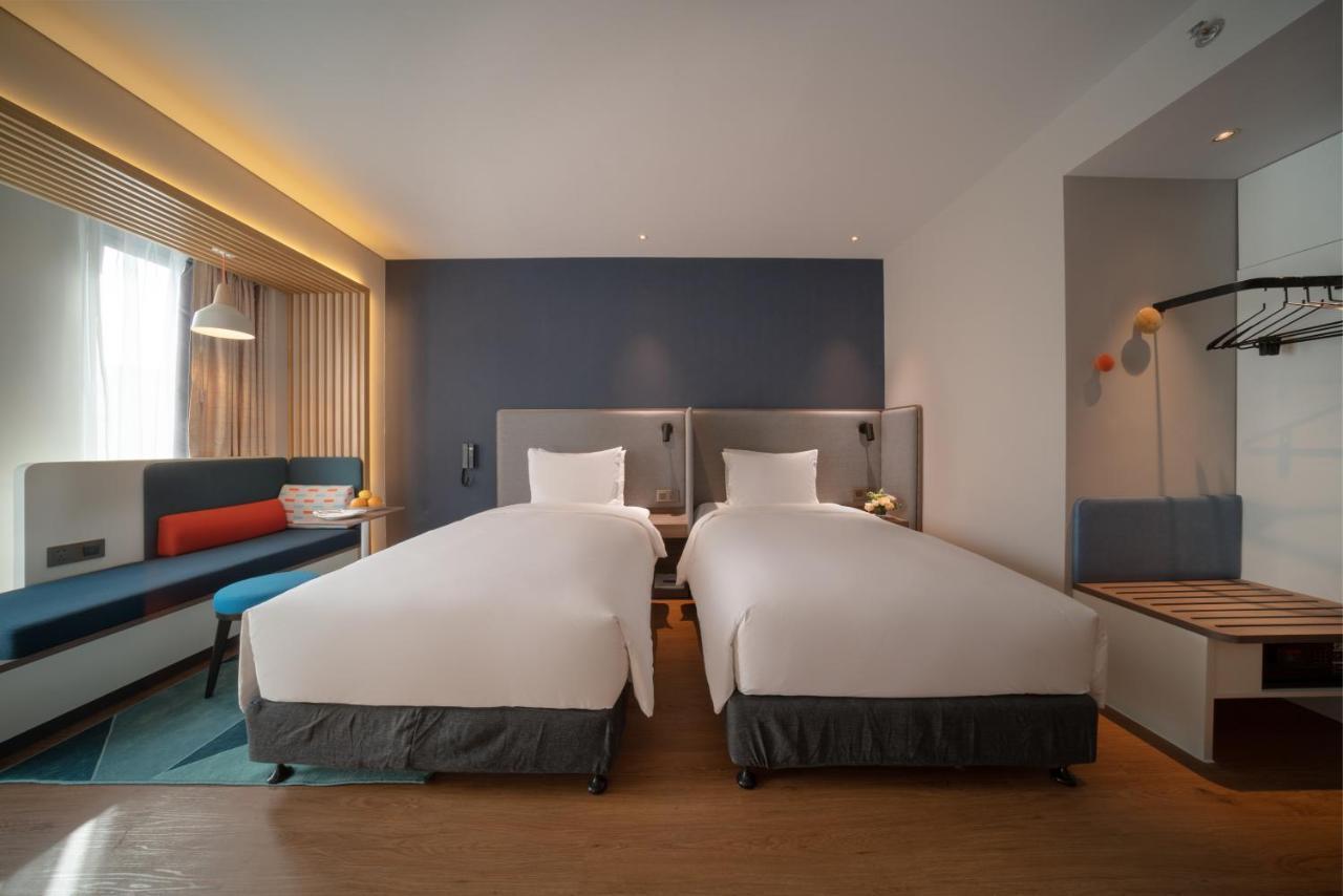 Holiday Inn Express Shanghai Huijin By Ihg Экстерьер фото